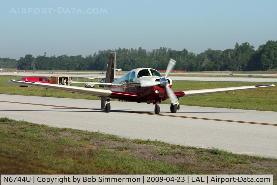 N6744U, 1963 Mooney M20D Master C/N 170, Arriving at Sun N Fun 2009 - Lakeland, Florida