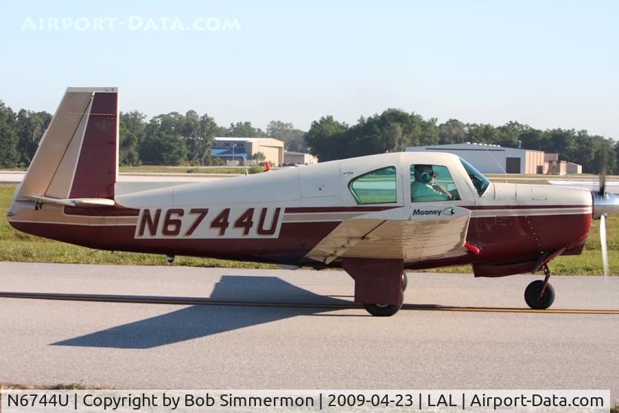 N6744U, 1963 Mooney M20D Master C/N 170, Arriving at Sun N Fun 2009 - Lakeland, Florida