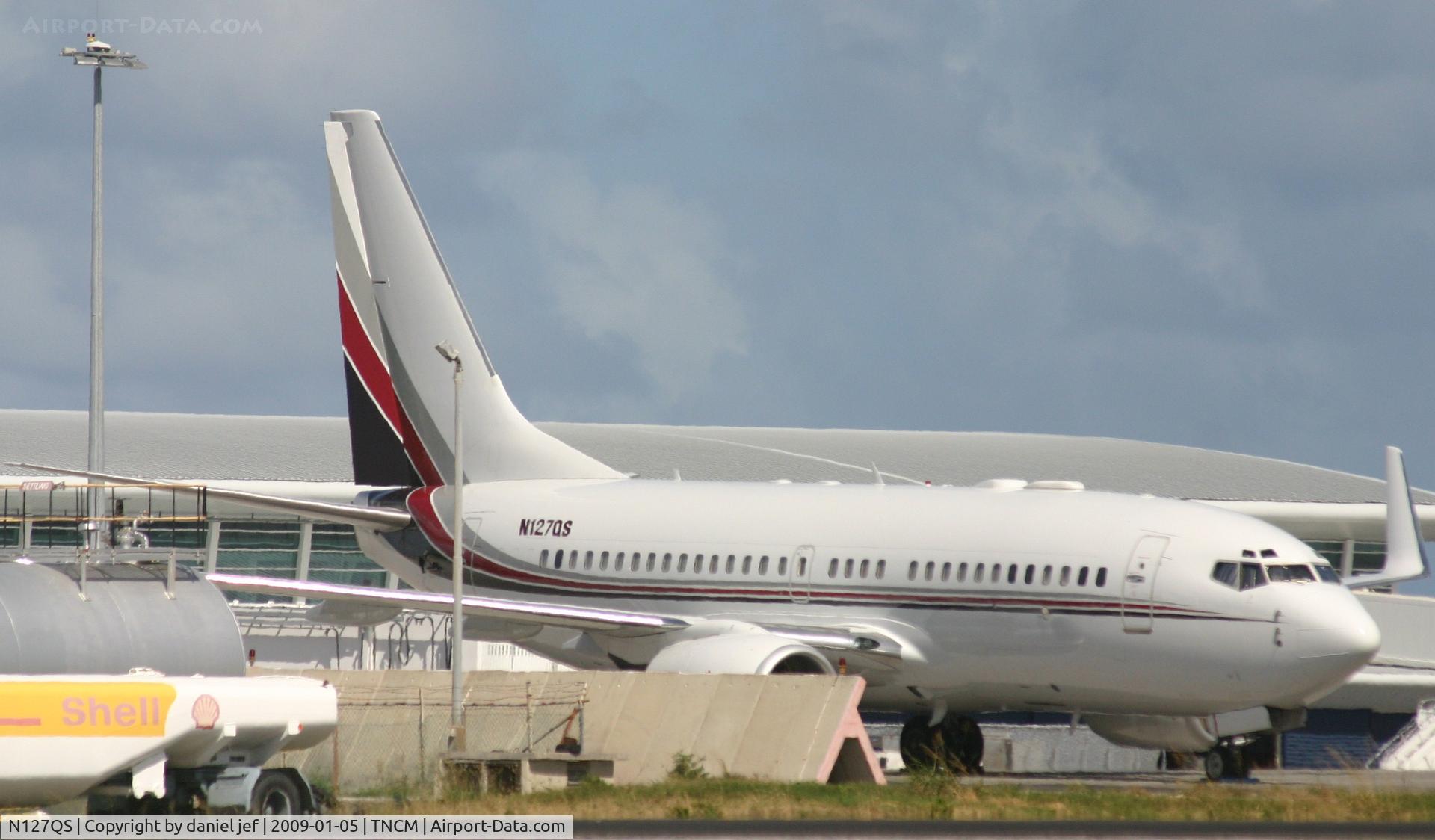 N127QS, 1999 Boeing 737-7BC C/N 30327, park at the  tncm ramp