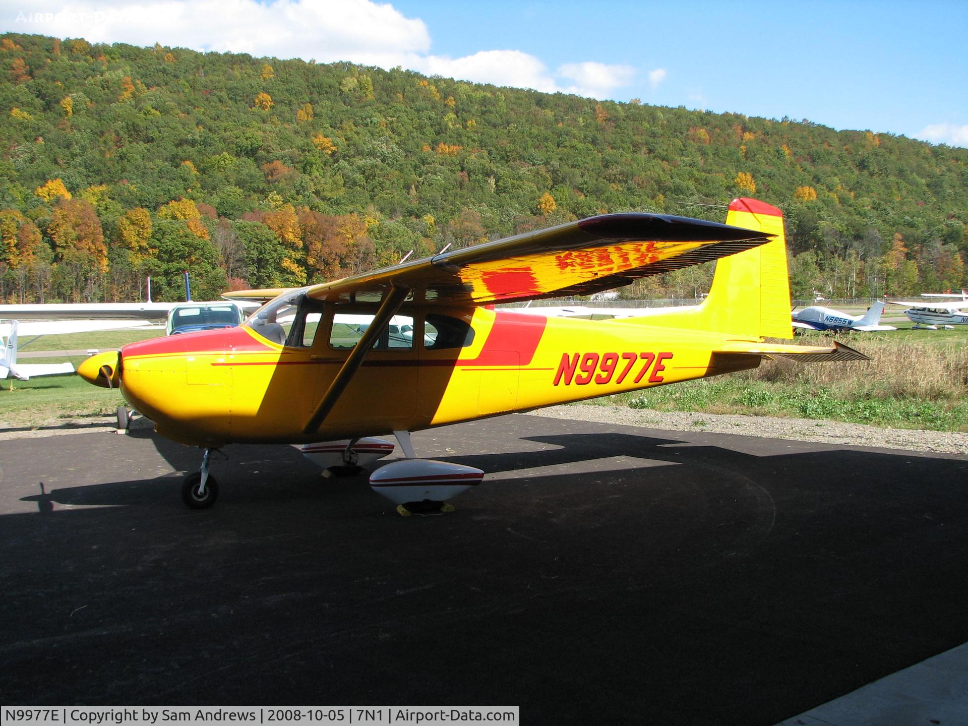 N9977E, 1958 Cessna 182A Skylane C/N 34853, Found this very colorful plane at a fund raiser at Painted Post NY.  I think I like the other paint job better.  But it's not my plane.