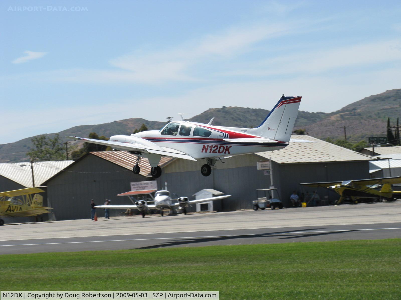 N12DK, 1967 Beech C55 Baron (95-C55) C/N TE-290, 1967 Beech 95-C55 BARON, two Continental IO-520-C 285 Hp each, takeoff climb Rwy 22