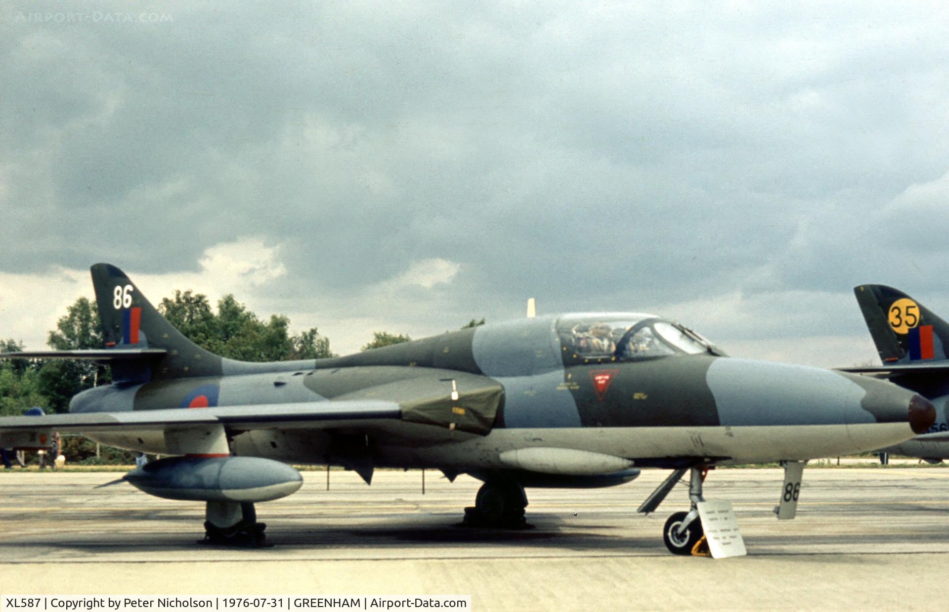 XL587, 1958 Hawker Hunter T.7 C/N 41H-693455, Hunter T.7 of the Tactical Weapons Unit at the 1976 Intnl Air Tattoo at RAF Greenham Common.
