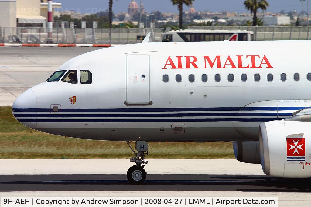 9H-AEH, 2004 Airbus A319-111 C/N 2122, Landing in Malta.