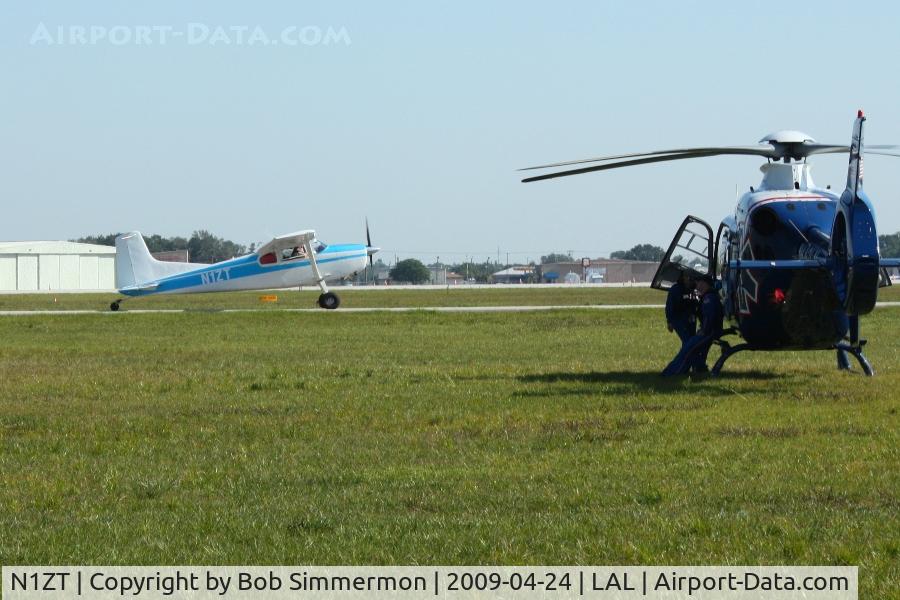N1ZT, 1954 Cessna 180 C/N 31597, Departing Sun N Fun 2009 - Lakeland, Florida