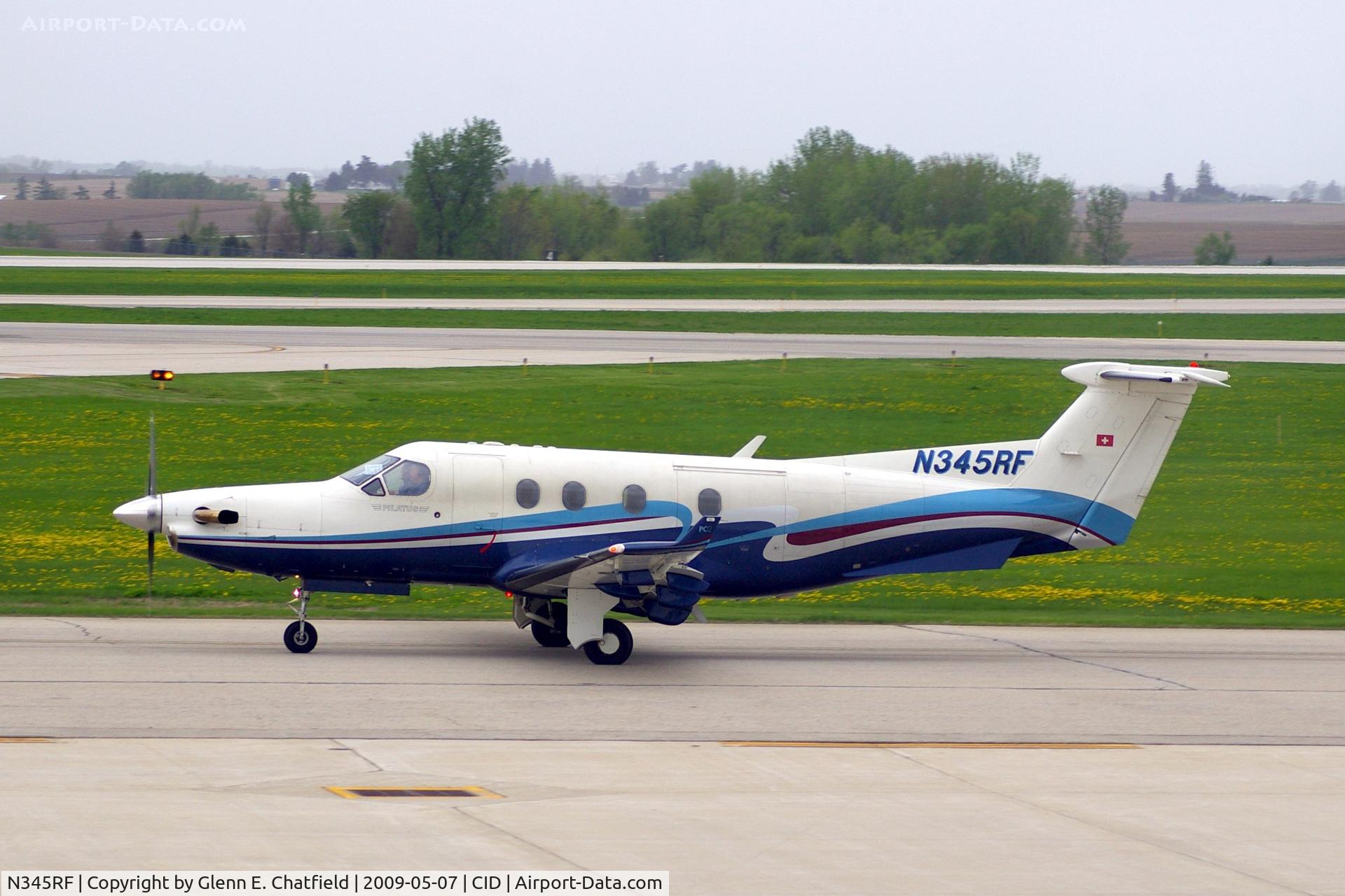 N345RF, 2000 Pilatus PC-12/45 C/N 345, Taxiing by my window on the way to runway 27.