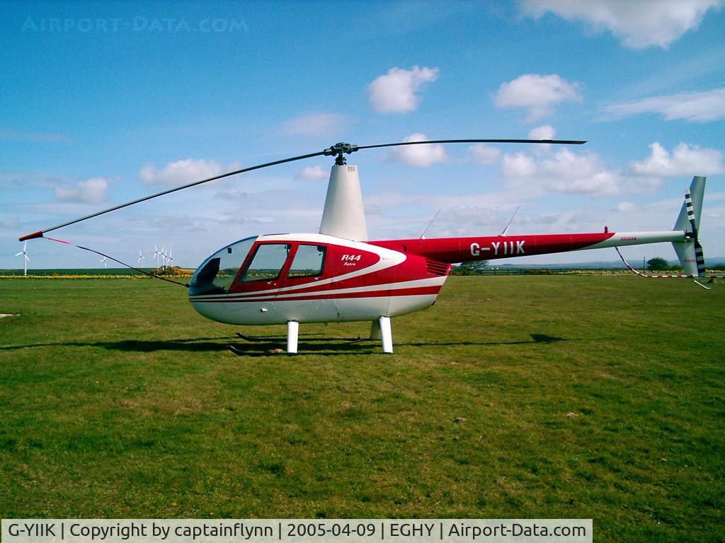 G-YIIK, 1999 Robinson R44 C/N 0640, At the time used for pleasure flights at Truro airfield. Written off in 2008.