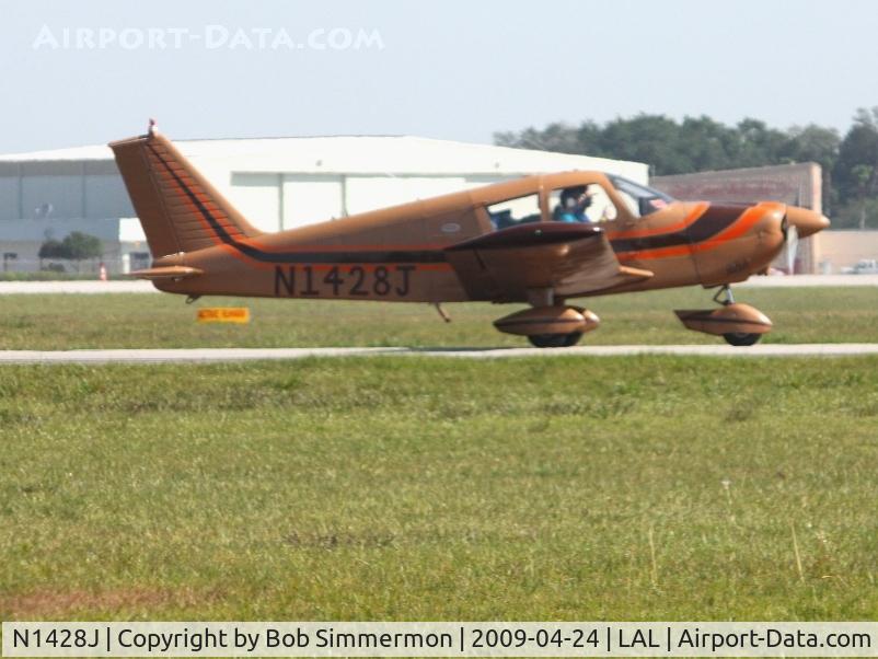 N1428J, 1966 Piper PA-28-180 C/N 28-3539, Departing Sun N Fun 2009 - Lakeland, Florida