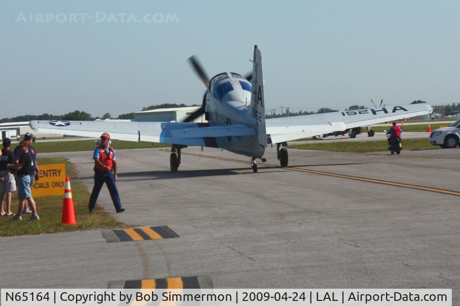 N65164, 1955 Douglas EA-1E Skyraider AD-5W C/N 55-471DH, Departing Sun N Fun 2009 - Lakeland, Florida