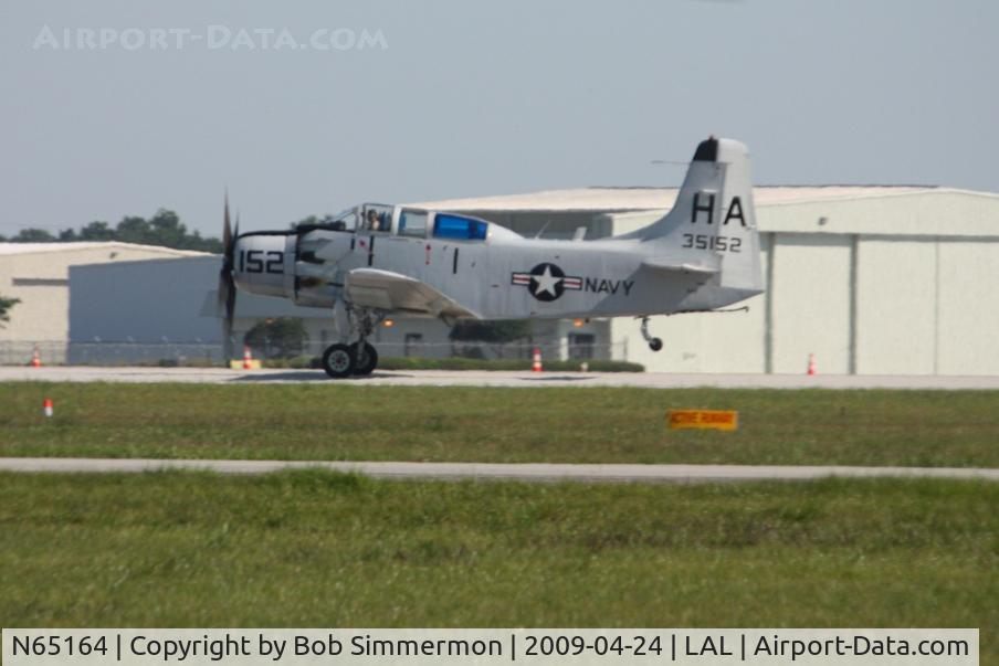 N65164, 1955 Douglas EA-1E Skyraider AD-5W C/N 55-471DH, Just a bit of right rudder, departing Sun N Fun 2009 - Lakeland, Florida
