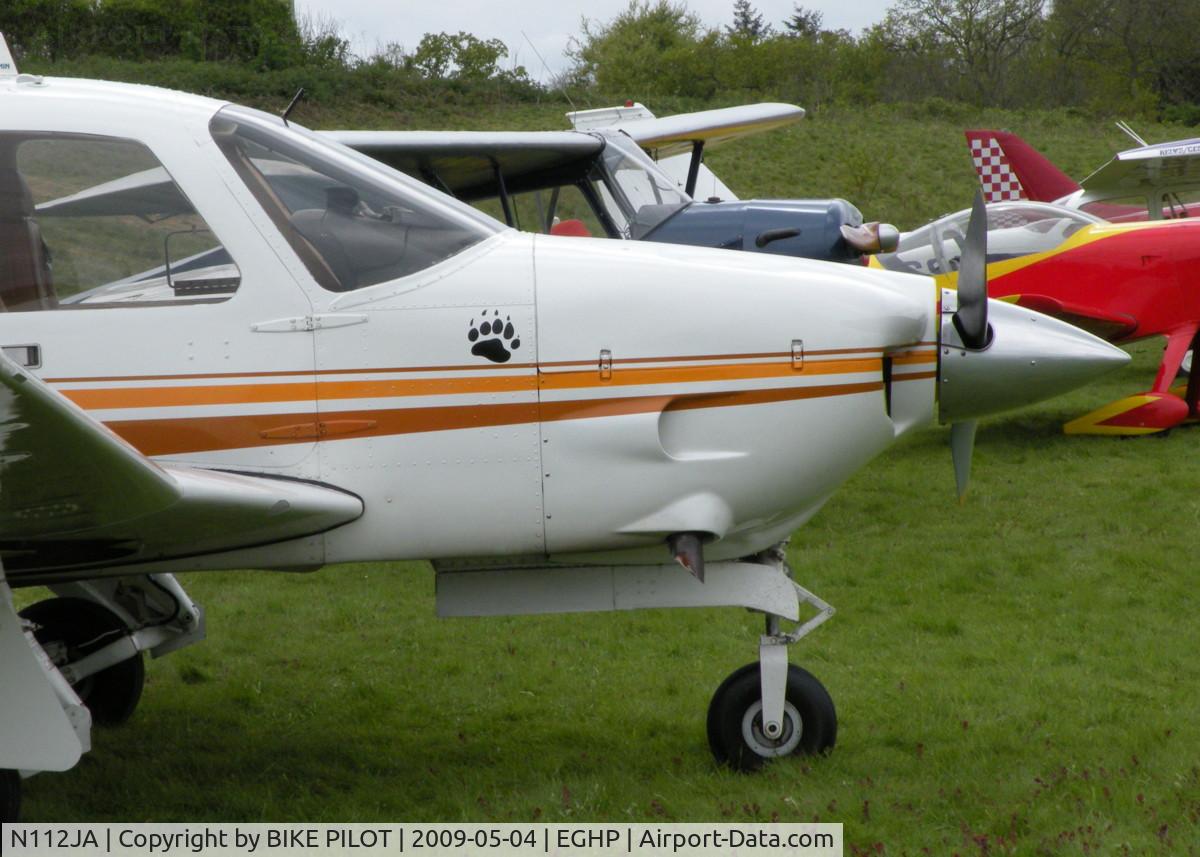 N112JA, 1977 Rockwell International 112TCA Commander C/N 13182, NICE COMMANDER IN THE A/C PARK