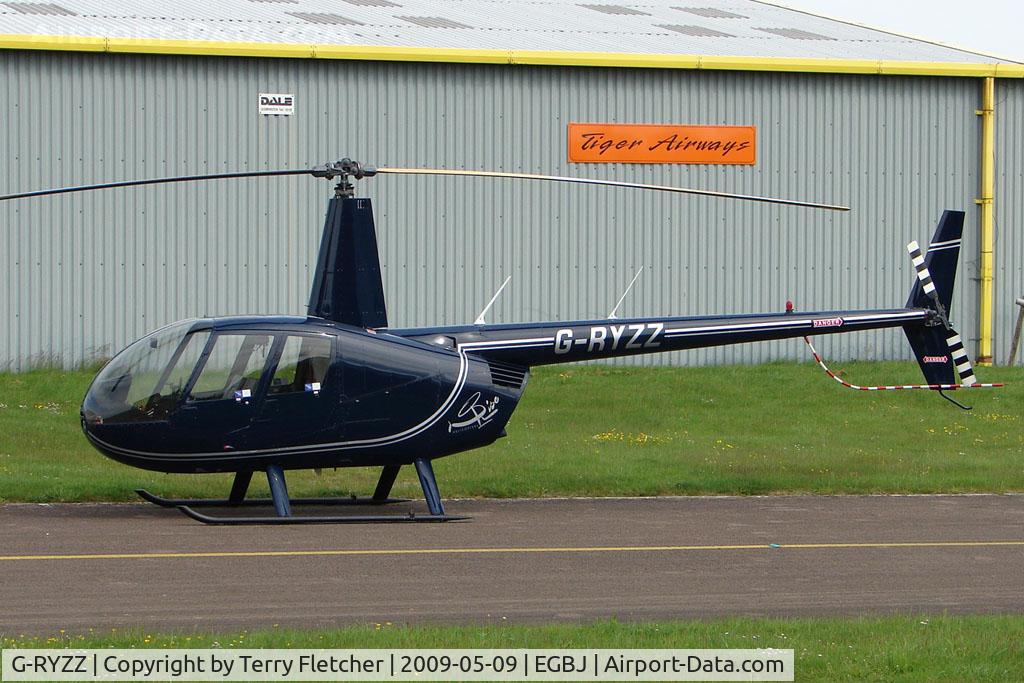 G-RYZZ, 2006 Robinson R44 Raven II C/N 11418, Robinson R44 At Staverton in May 2009