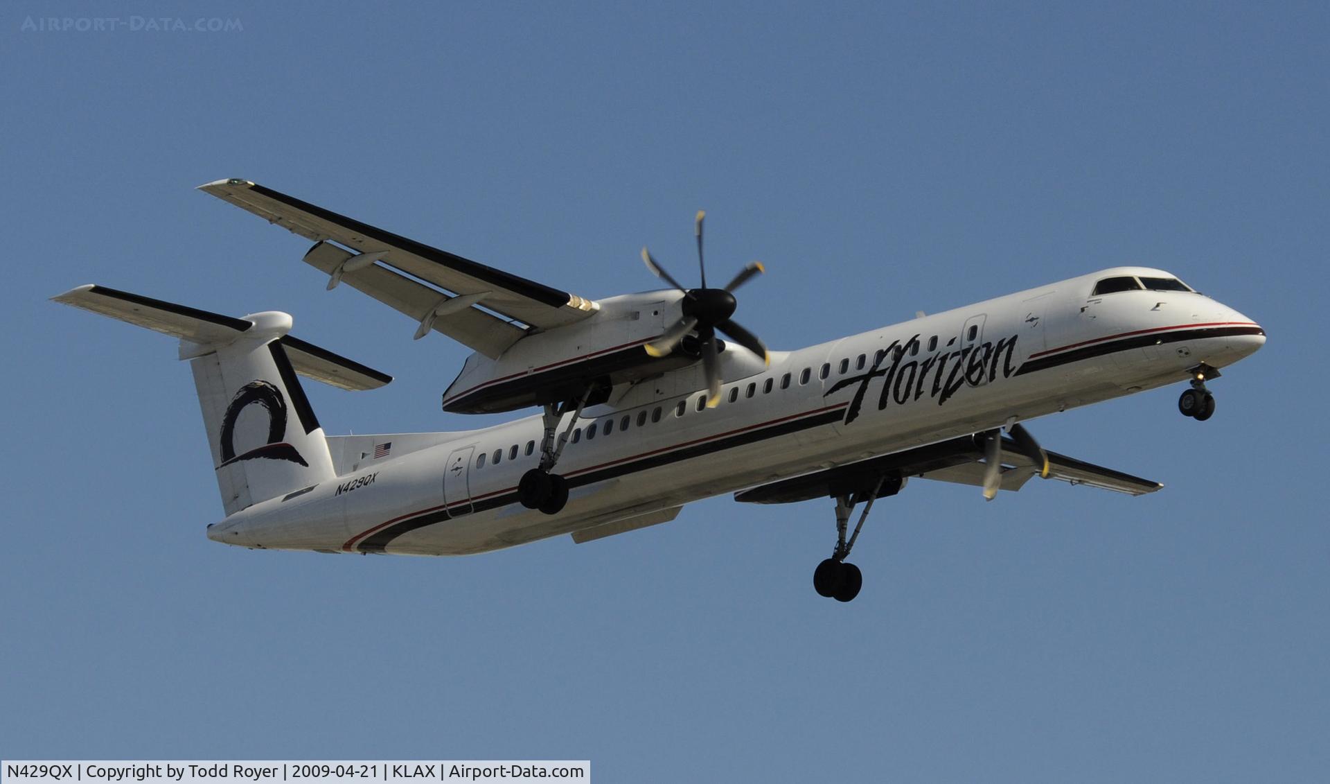 N429QX, 2007 De Havilland Canada DHC-8-402 Dash 8 C/N 4161, Landing 24R at LAX