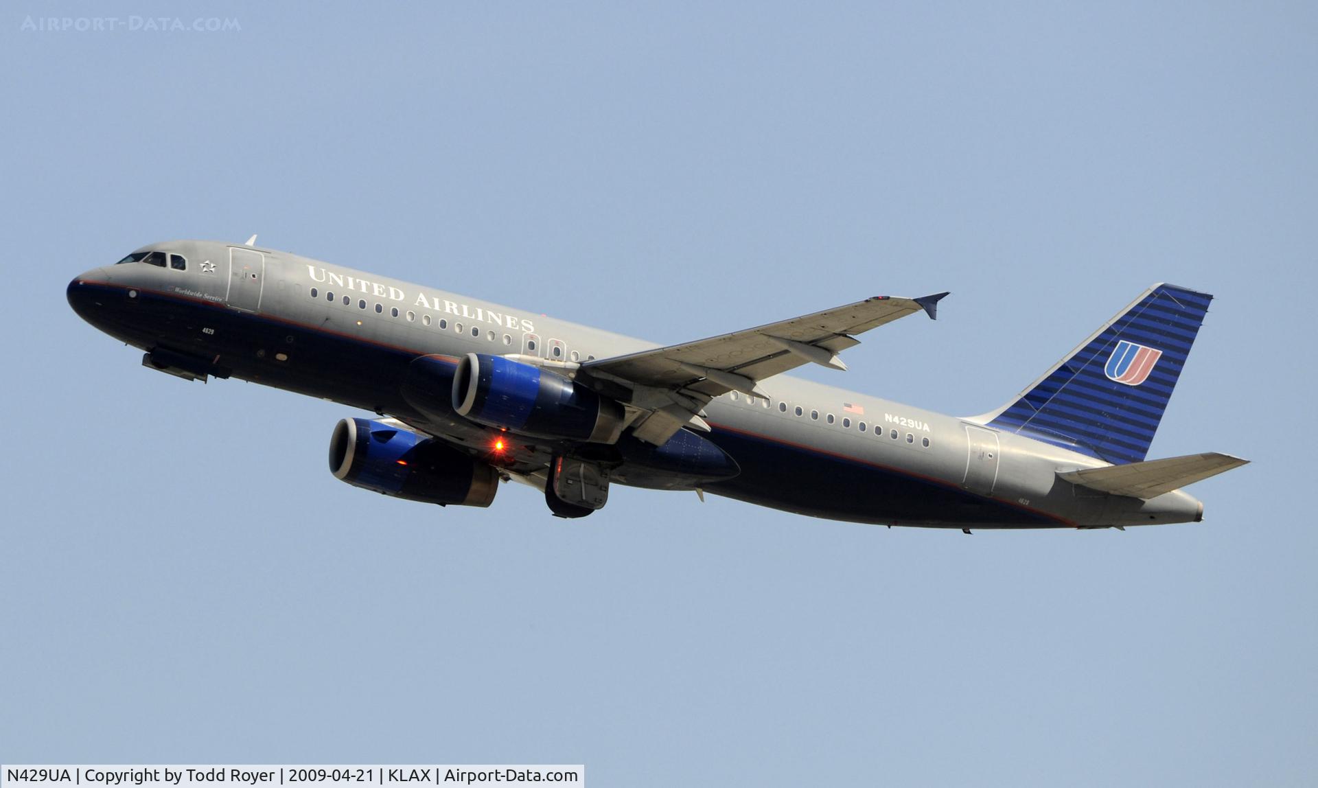 N429UA, 1995 Airbus A320-232 C/N 539, Departing LAX on 25R