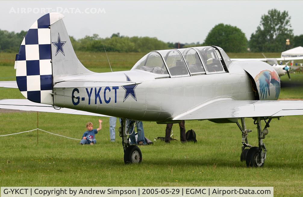 G-YKCT, 1990 Bacau Yak-52 C/N 9010307, Departing Southend.