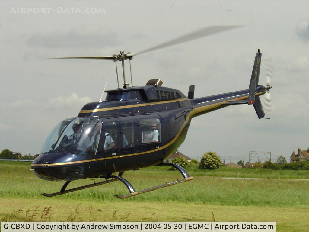 G-CBXD, 1989 Bell 206L-3 LongRanger III C/N 51328, Departing Southend.