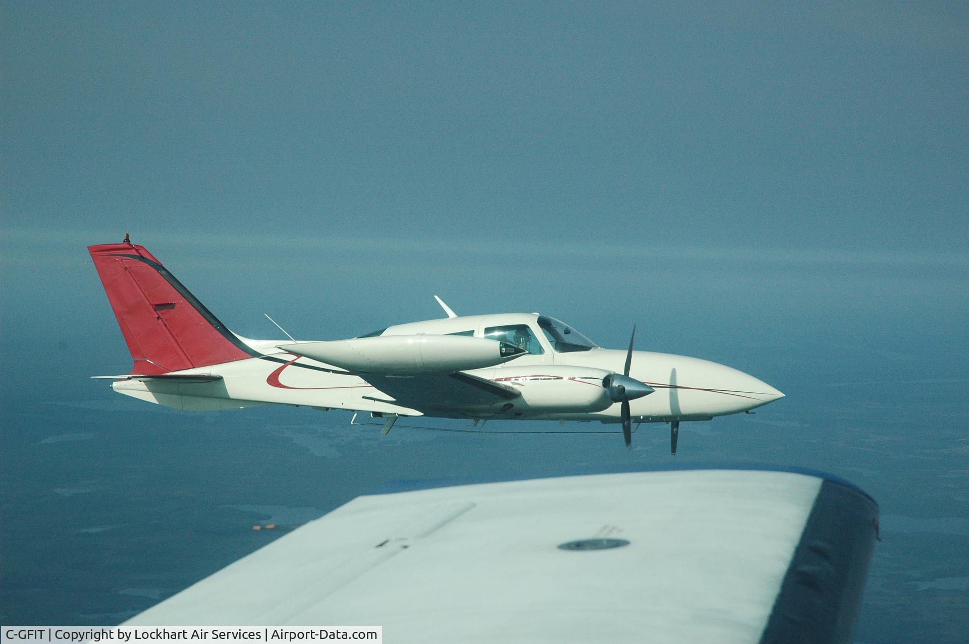 C-GFIT, 1980 Cessna 310R C/N 310R1865, GFIT inflight to Kasabonika, On. Picture taken from FKQM