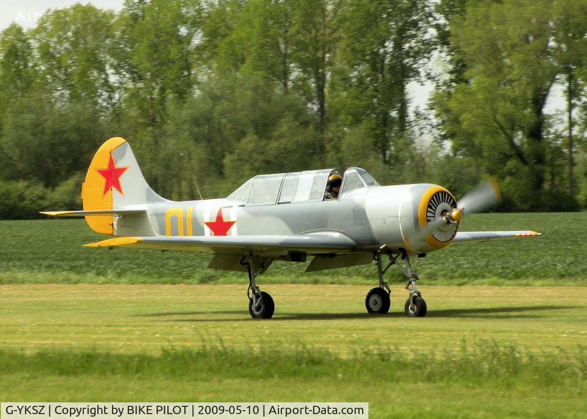 G-YKSZ, 1993 Yakovlev (Aerostar) Yak-52 C/N 9311709, LANDING ROLL RWY 07 BRIMPTON FLY-IN