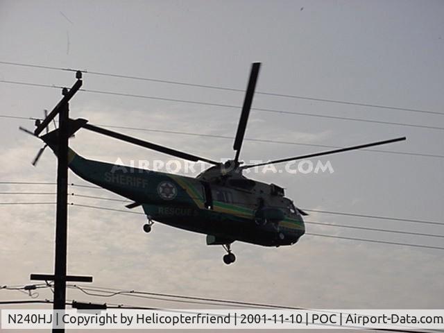 N240HJ, Sikorsky SH-3H Sea King C/N 152712, Preparing to land to pick up injured person in Claremont