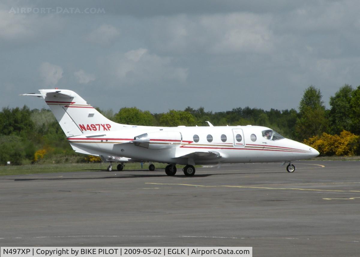 N497XP, 2006 Raytheon 400A BeechJet C/N RK-497, TAXYING TOWARDS THE TERMINAL FOR A BRIEF STOP