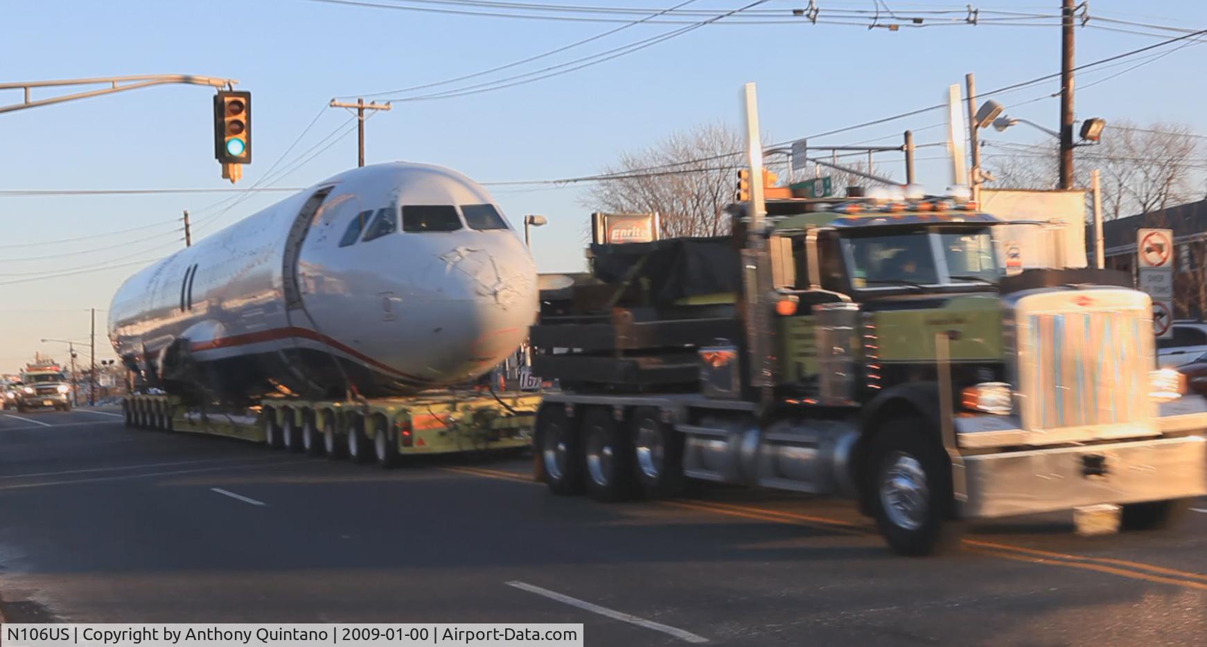 N106US, 1999 Airbus A320-214 C/N 1044, The body of US Airways Flight 1549 on Route 46 in New Jersey, being towed to Harrison, N.J. for further inspection.
