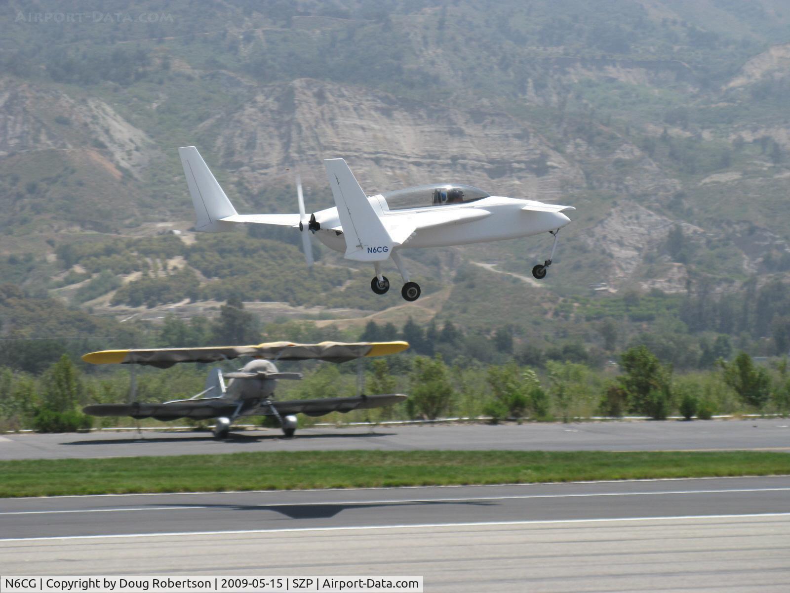 N6CG, 1995 Rutan Long-EZ C/N 310, 1995 Cutting RUTAN LONG EZ, Lycoming O-235, takeoff climb Rwy 22, nose gear not retracted yet.