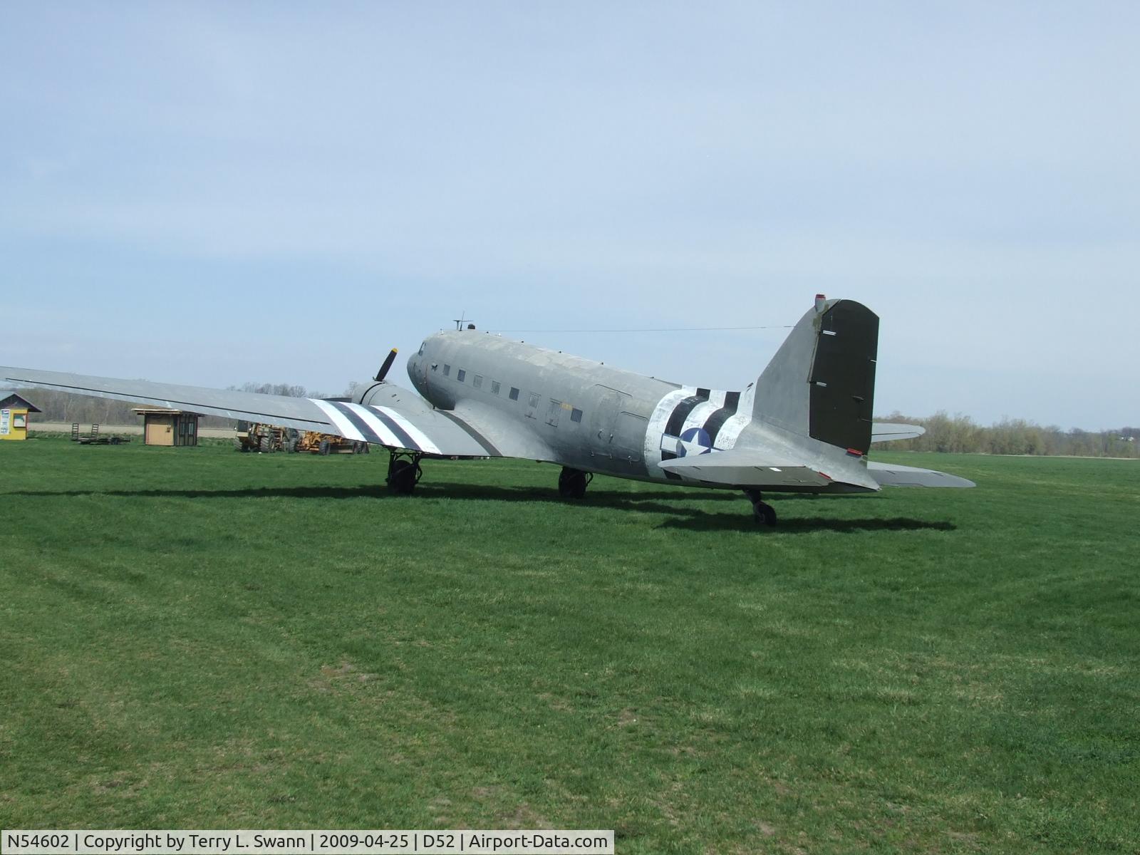N54602, 1943 Douglas C-47B C/N 15635/27080, Setting in the grass at Geneseo.