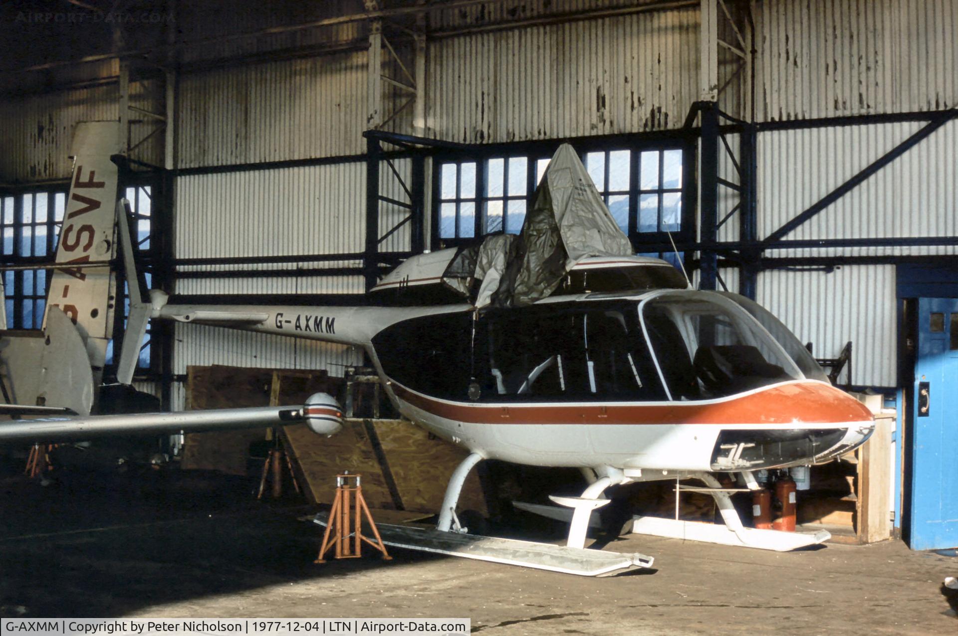 G-AXMM, 1969 Bell 206B JetRanger II C/N 405, This JetRanger was seen hangered at Luton in December 1977.