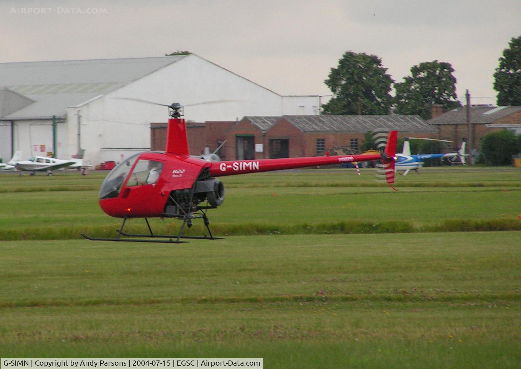 G-SIMN, 1997 Robinson R22 Beta C/N 2769, training at its home base Cambridge