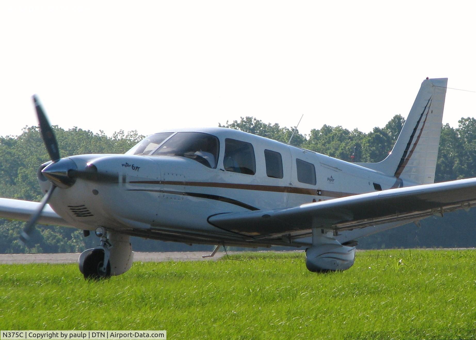 N375C, 2003 Piper PA-32-301XTC Saratoga C/N 3255002, Taxiing to runway 14 at Downtown Shreveport.