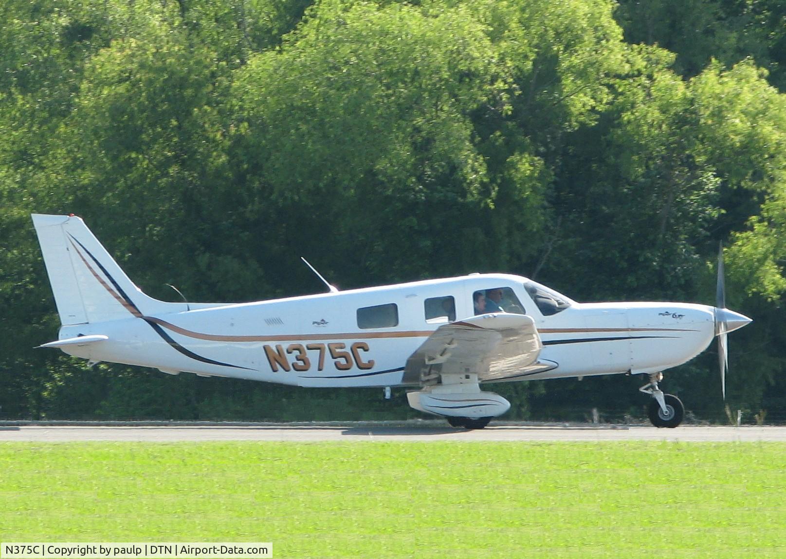 N375C, 2003 Piper PA-32-301XTC Saratoga C/N 3255002, Starting to roll on runway 14 at the Shreveport Downtown airport.