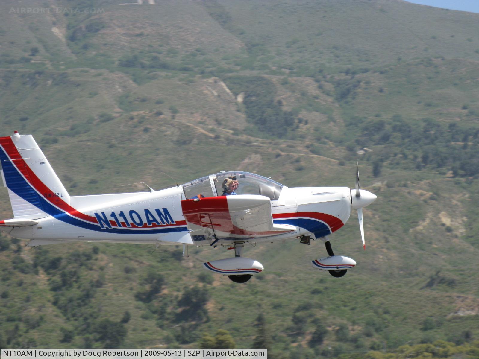 N110AM, 1996 Zlin Z-242L C/N 0727, 1996 Moravan Zlin Z242L fully aerobatic, Lycoming AEIO-360-B 200 Hp, takeoff climb Rwy 22