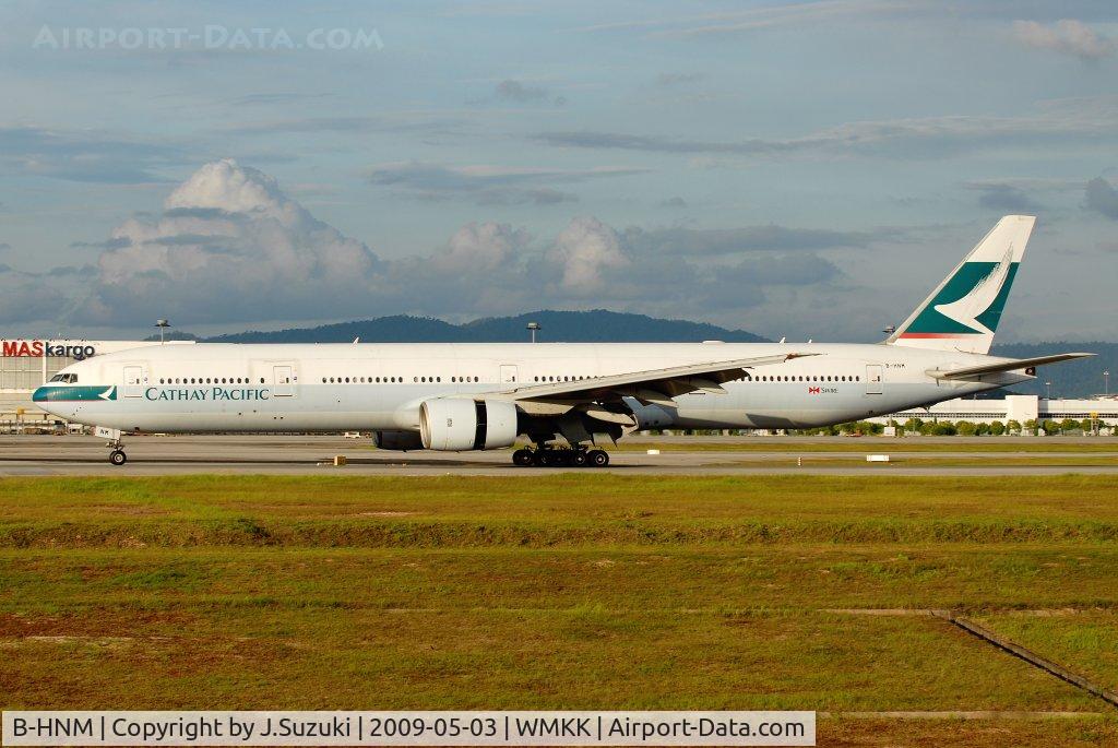 B-HNM, 2003 Boeing 777-367 C/N 33702, From HKG
