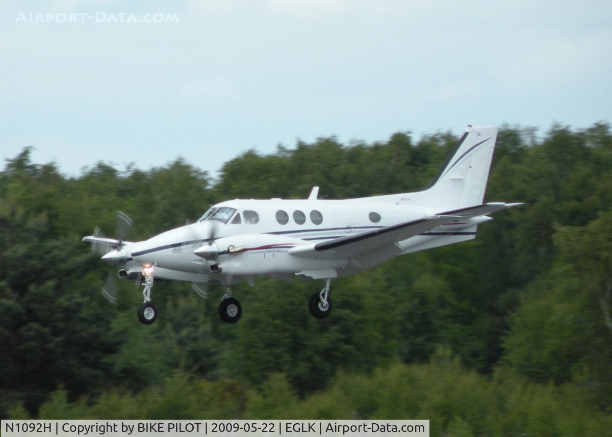 N1092H, 1996 Raytheon C90A King Air C/N LJ-1454, JUST OVER THE FENCE FOR RWY 25