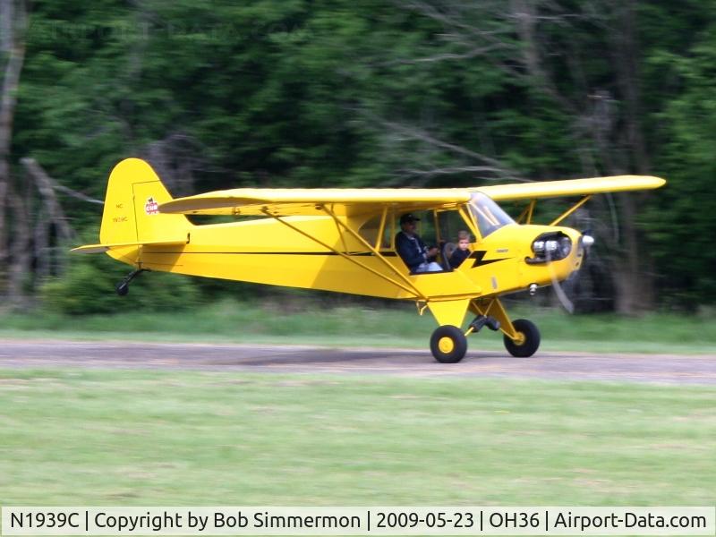 N1939C, Piper J3C-65 Cub Cub C/N 4731, Landing on 3 at Zanesville Riverside with a wide-eyed Young Eagle passenger.