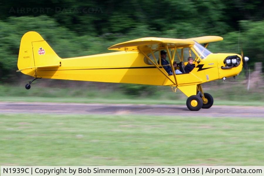 N1939C, Piper J3C-65 Cub Cub C/N 4731, Landing on 3 at Zanesville Riverside with a wide-eyed Young Eagle passenger.