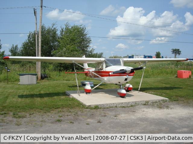 C-FKZY, 1973 Cessna 150L C/N 15074889, FKZY under blue sky