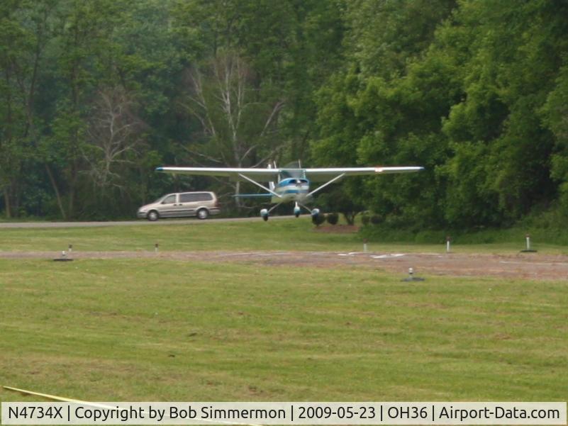 N4734X, 1966 Cessna 150G C/N 15064784, Nicely dropped in behind the trees for an on-the-numbers landing on 3 at Zanesville Riverside.