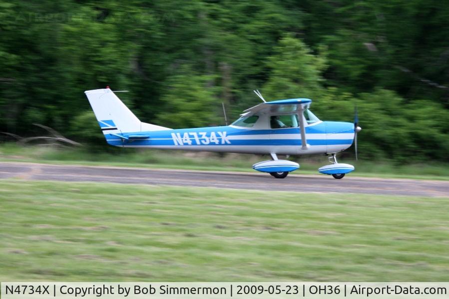 N4734X, 1966 Cessna 150G C/N 15064784, Landing on 3 at Zanesville Riverside with a wide-eyed Young Eagle passenger.