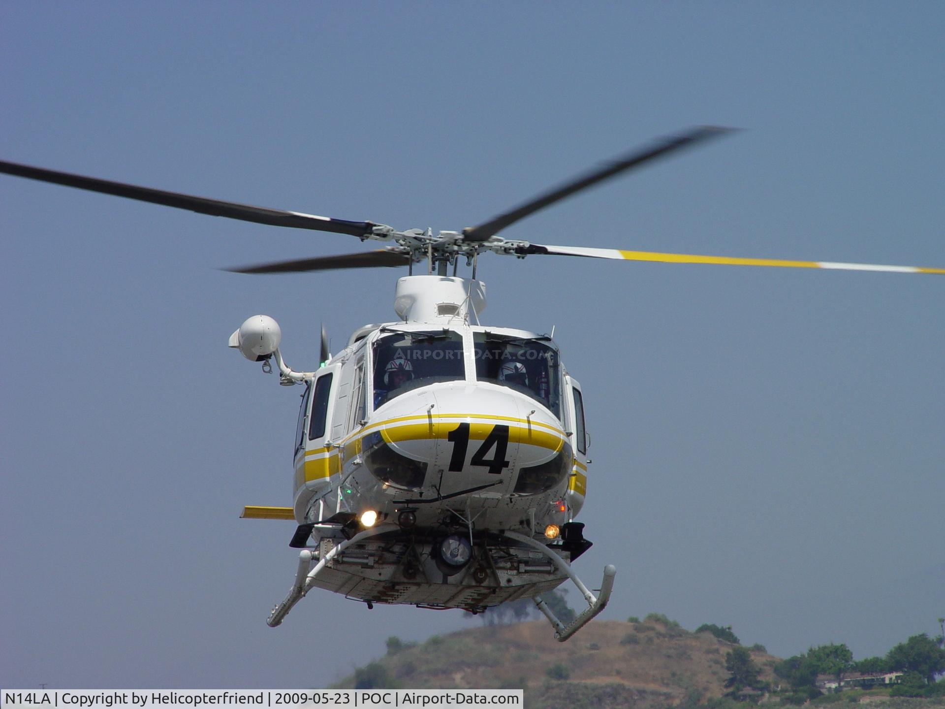N14LA, 2005 Bell 412EP C/N 36393, Looking at me prior to turning north for landing at EHA helipad