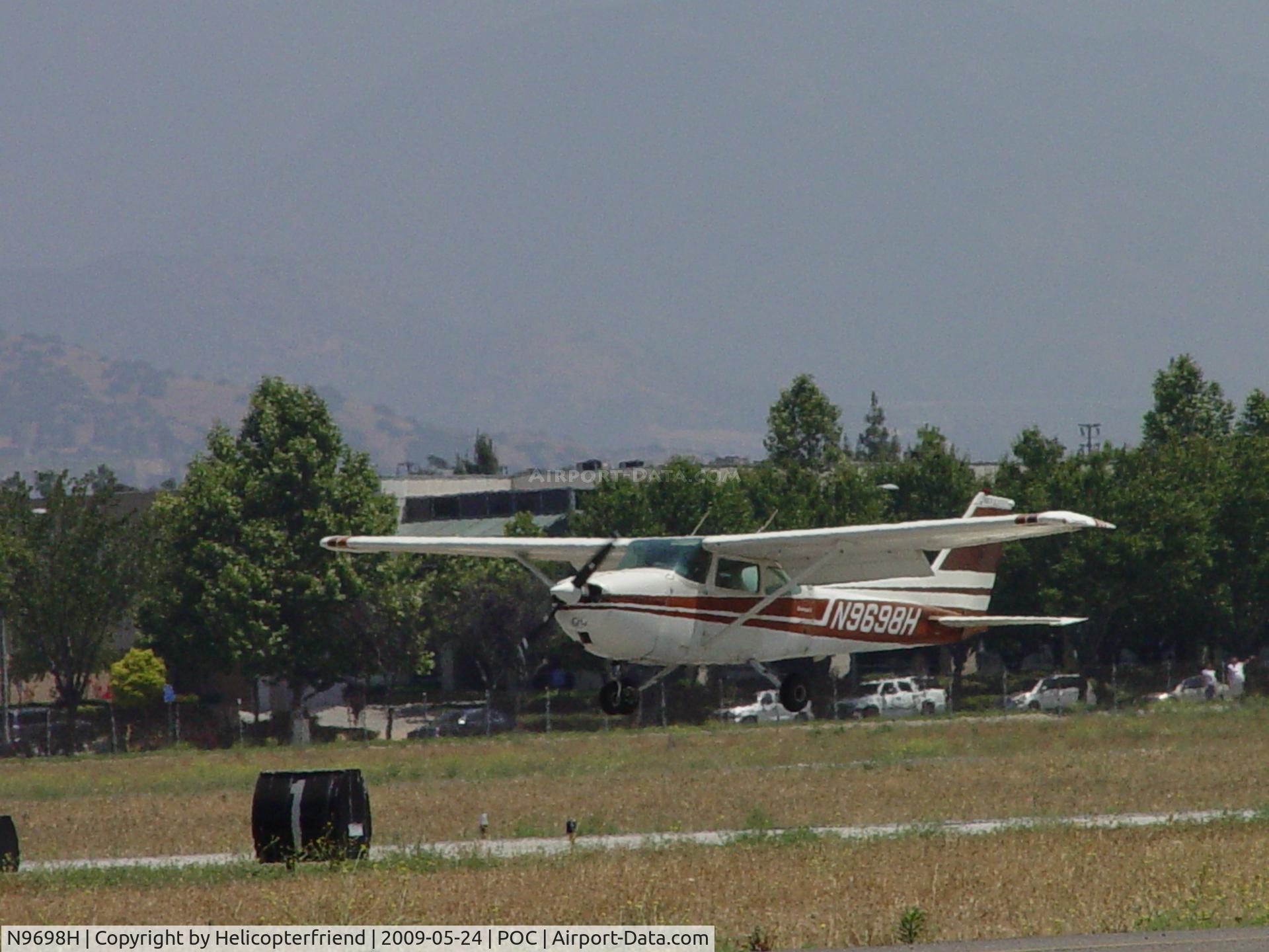 N9698H, 1975 Cessna 172M C/N 17266322, Touching down 26L