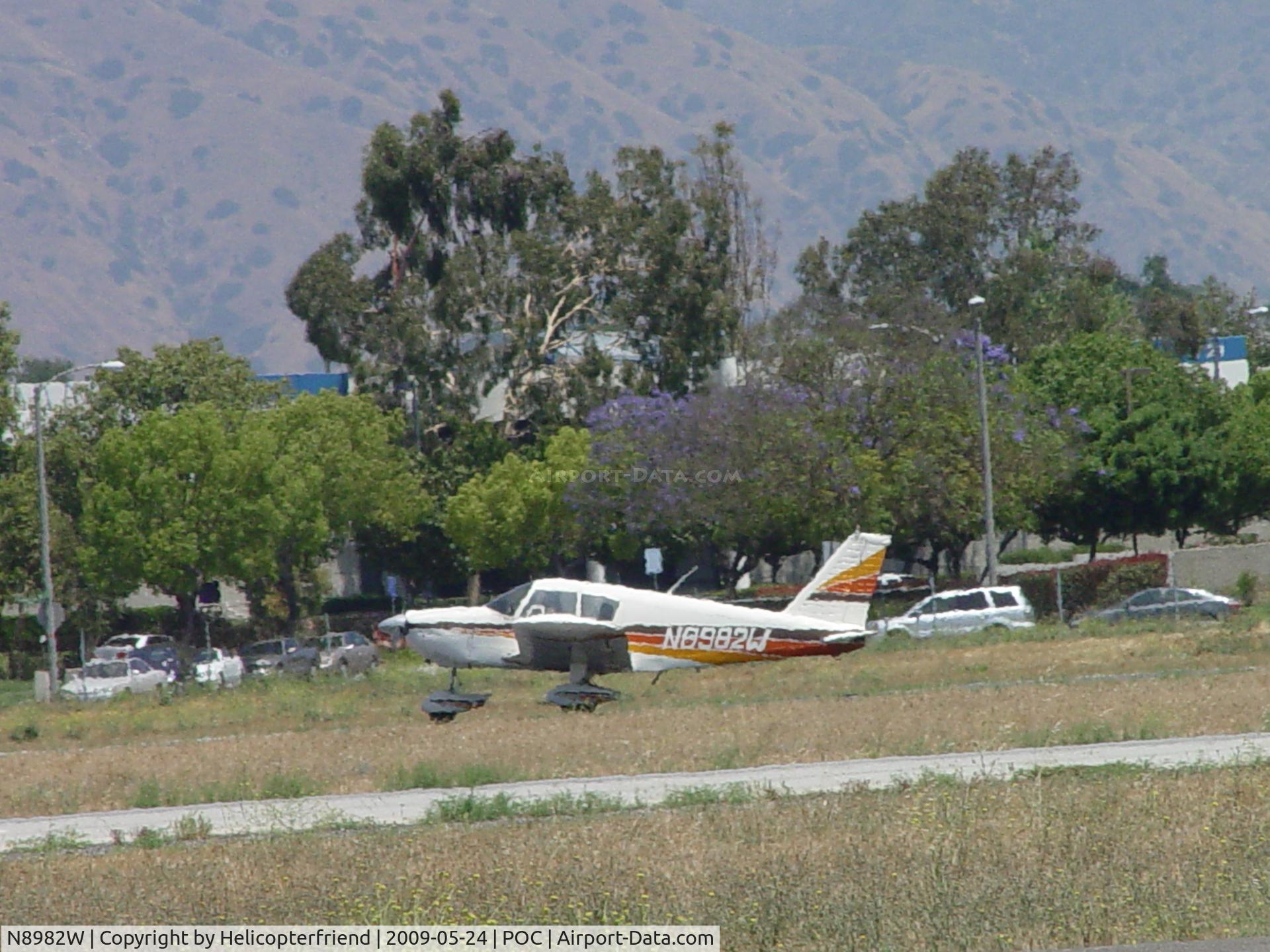 N8982W, 1966 Piper PA-28-235 C/N 28-10815, Touching down on 26R