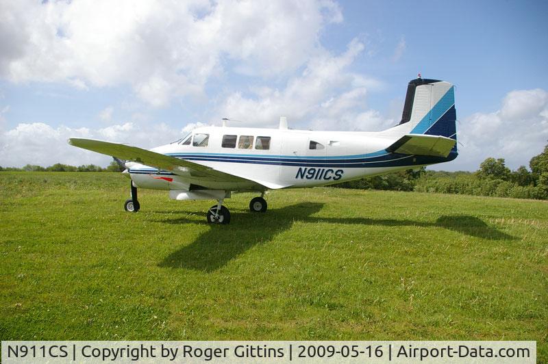 N911CS, 1960 Beech U-8F Seminole C/N LF-21, Parked on grass airstrip UK ST775495