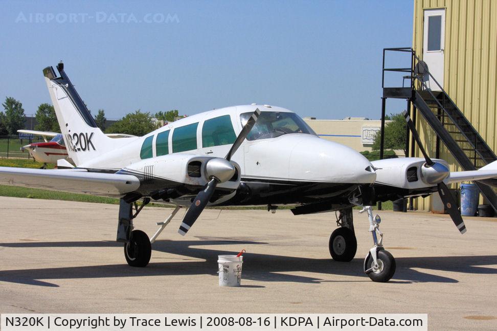 N320K, 1961 Cessna 320 Skyknight C/N 320-0018, 320 at DPA with bird guts on number 2