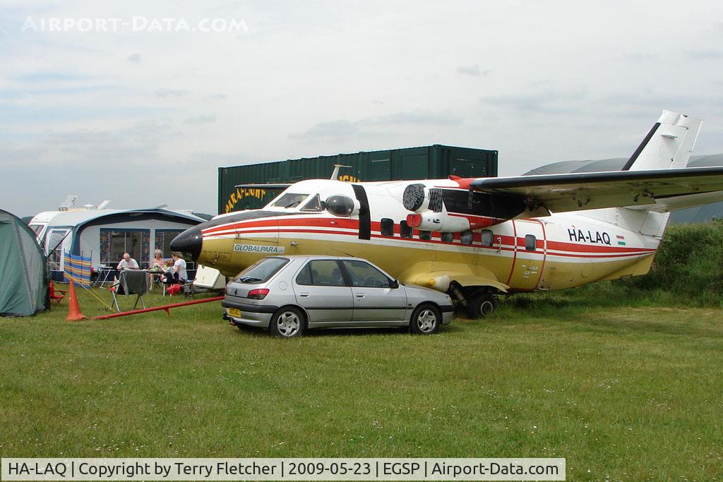 HA-LAQ, 1984 Let L-410UVP Turbolet C/N 841332, Sored Let 410 now acting as a windbreak for the Parachutists Tents !!!