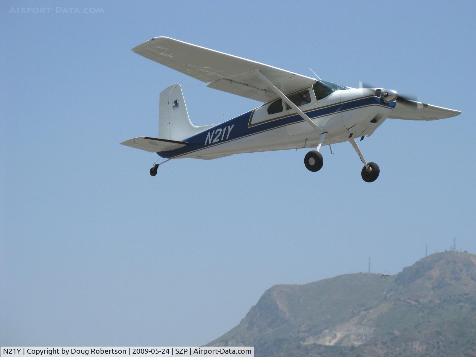 N21Y, 1954 Cessna 180 C/N 30837, 1954 Cessna 180, Continental O-470 225 Hp, takeoff climb Rwy 22