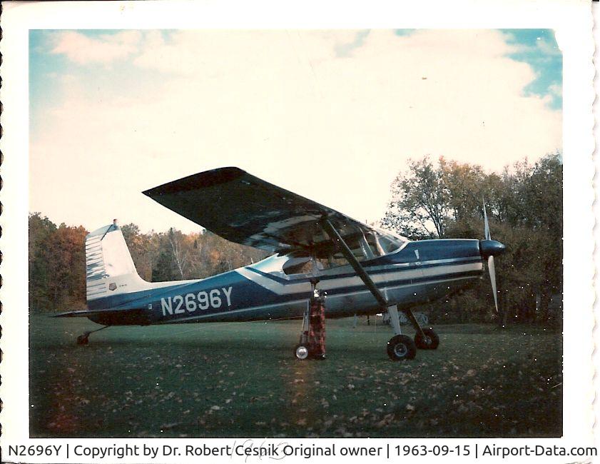 N2696Y, 1962 Cessna 180F C/N 18051196, Phot Back Says 1st Color Poloroid. On Golf course MN