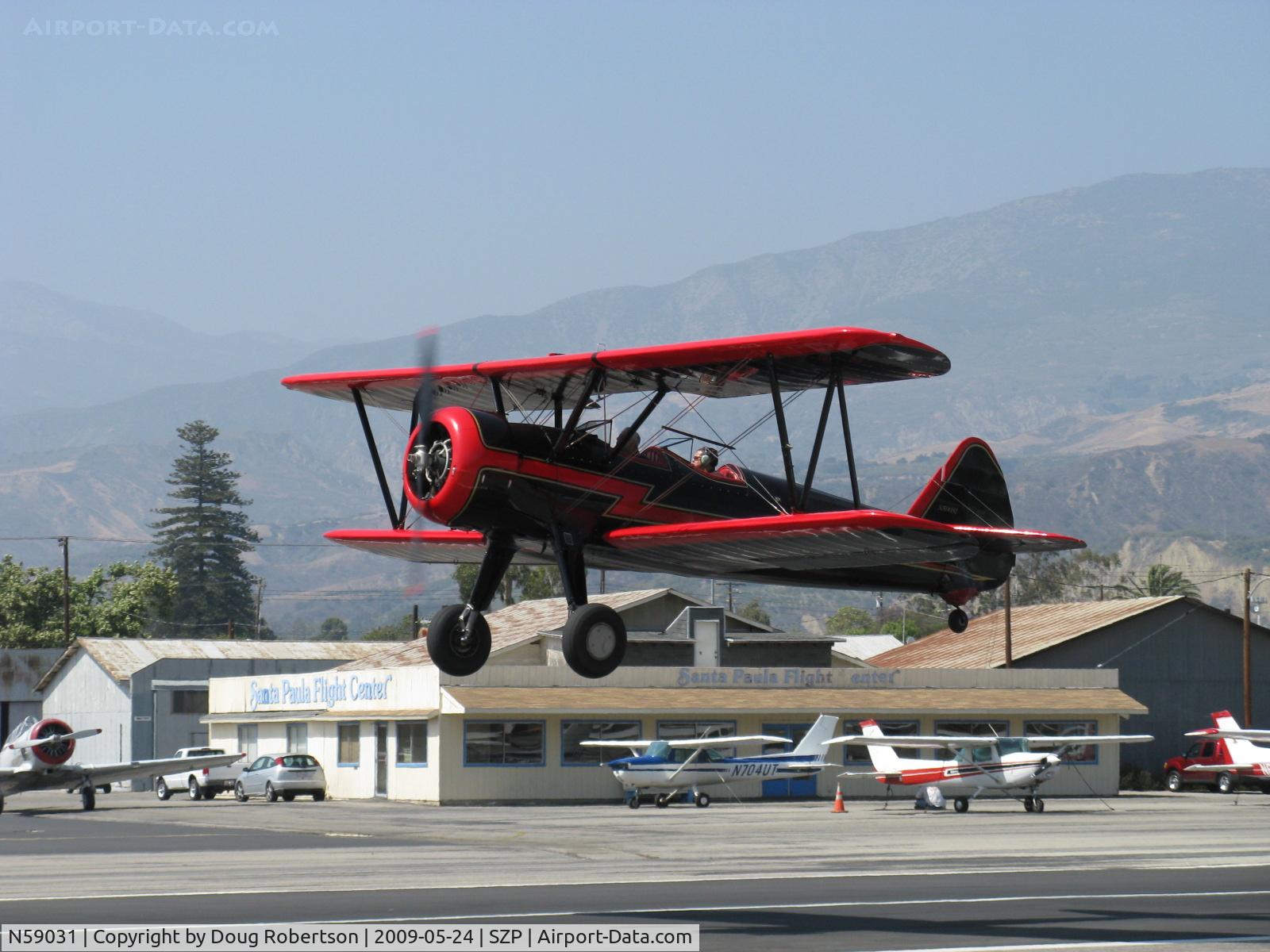 N59031, 1941 Boeing A75N1(PT17) C/N 75-3808, 1941 Boeing Stearman A75N1, Continental W670 220 Hp, another takeoff climb Rwy 22