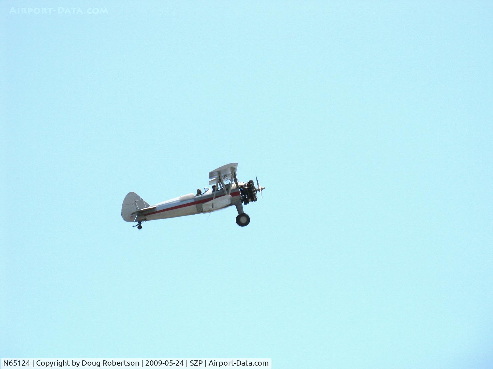 N65124, 1943 Boeing A75N1(PT17) C/N 75-1260, 1943 Boeing Stearman A75N1 'Spirit of OPEC', P&W R-985 450 Hp (by Jacobs), squared wingtips, takeoff climb Rwy 22