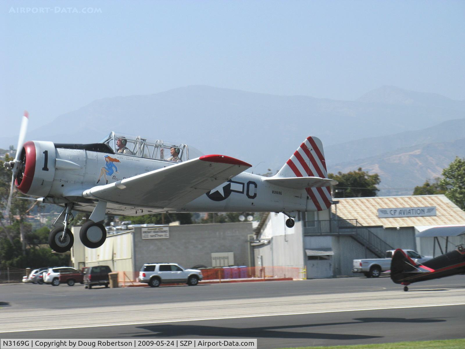 N3169G, 1945 North American AT-6F Texan C/N 121-42937, 1945 North American AT-6F TEXAN 'Daring Diane' of the Condor Squadron, P&W R-1340 550 Hp, takeoff climb Rwy 22 departing to VNY.