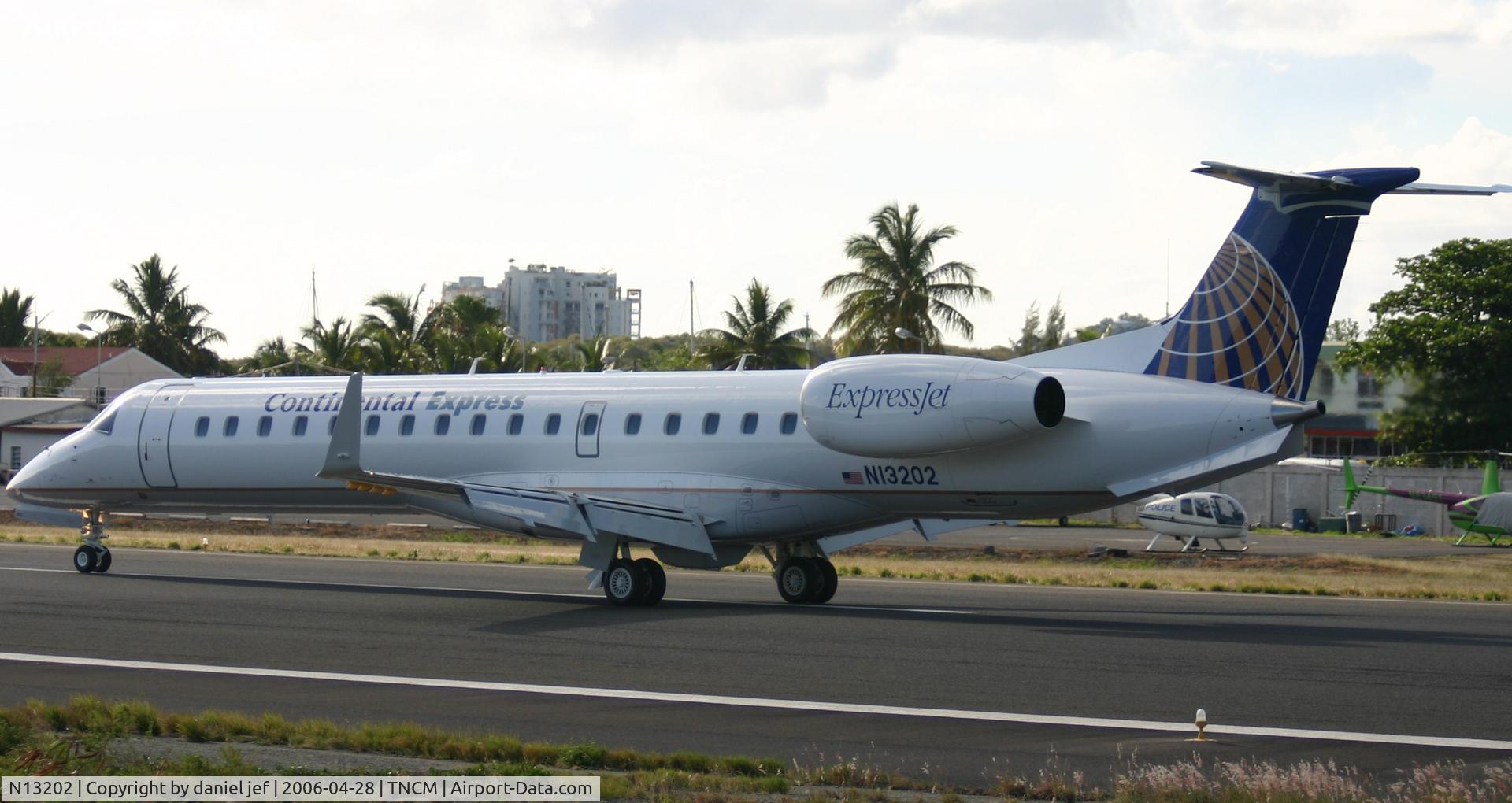 N13202, 2006 Embraer ERJ-145XR (EMB-145XR) C/N 14500962, Back tracking runway 10